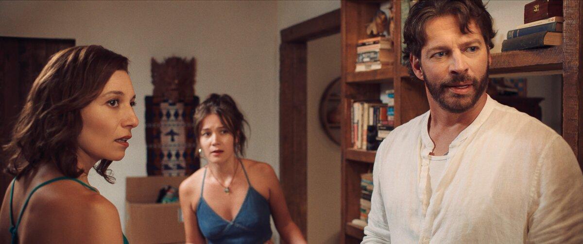 (L–R) Sia (Agni Scott), Melina (Ali Fumiko Whitney), and John Allman (Harry Connick Jr.) work out family issues, in “Find Me Falling.” (MovieStillsDB)