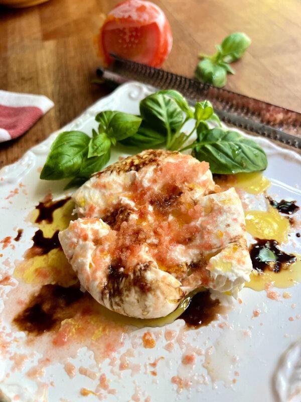 Like it fast and easy? Shave a frozen tomato over fresh burrata for a light summer appetizer. (Gretchen McKay/Pittsburgh Post-Gazette/TNS)
