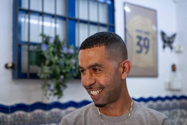 Mounir Nasraoui smiles at 'El Cordobes' bar in Rocafonda, the neighbourhood where his son grew up, in Mataro, 35km from Barcelona, on July 11, 2024. (Josep Lago/AFP via Getty Images)