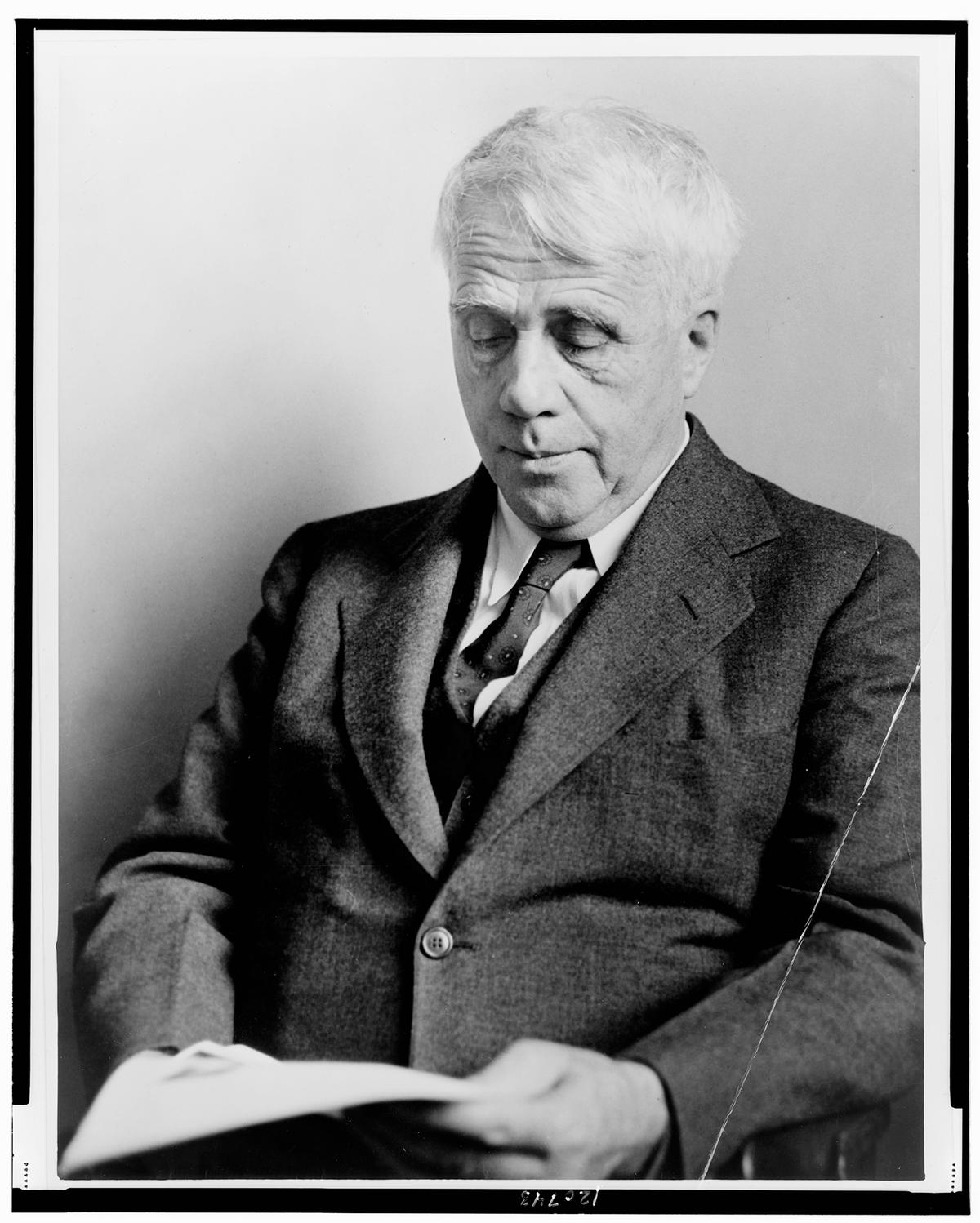A portrait of Robert Frost reading by World-Telegram photographer Fred Palumbo, 1941. Library of Congress. (Public Domain)