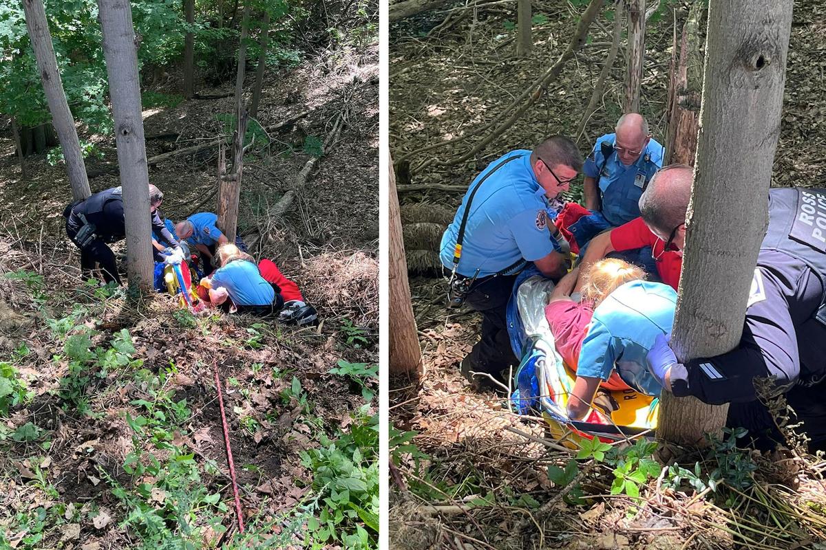 First responders are seen carefully placing the man on a gurney to be lifted up the steep hill. (Courtesy of Ross/West View EMS)