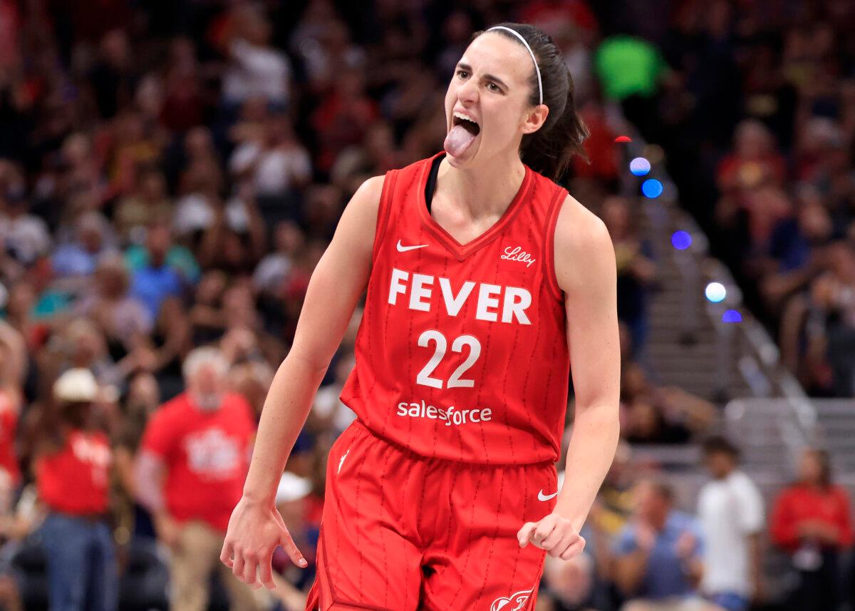 Caitlin Clark #22 of the Indiana Fever reacts after a three pointer during the first half at Gainbridge Fieldhouse in Indianapolis, Ind., on Aug. 16, 2024. (Justin Casterline/Getty Images)