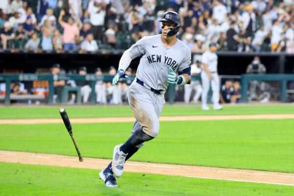 Aaron Judge (99) of the New York Yankees runs the bases after hitting a three-run home run, his 300th career home run, during the eighth inning against the Chicago White Sox at Guaranteed Rate Field in Chicago, Ill., on Aug. 14, 2024. (Justin Casterline/Getty Images)
