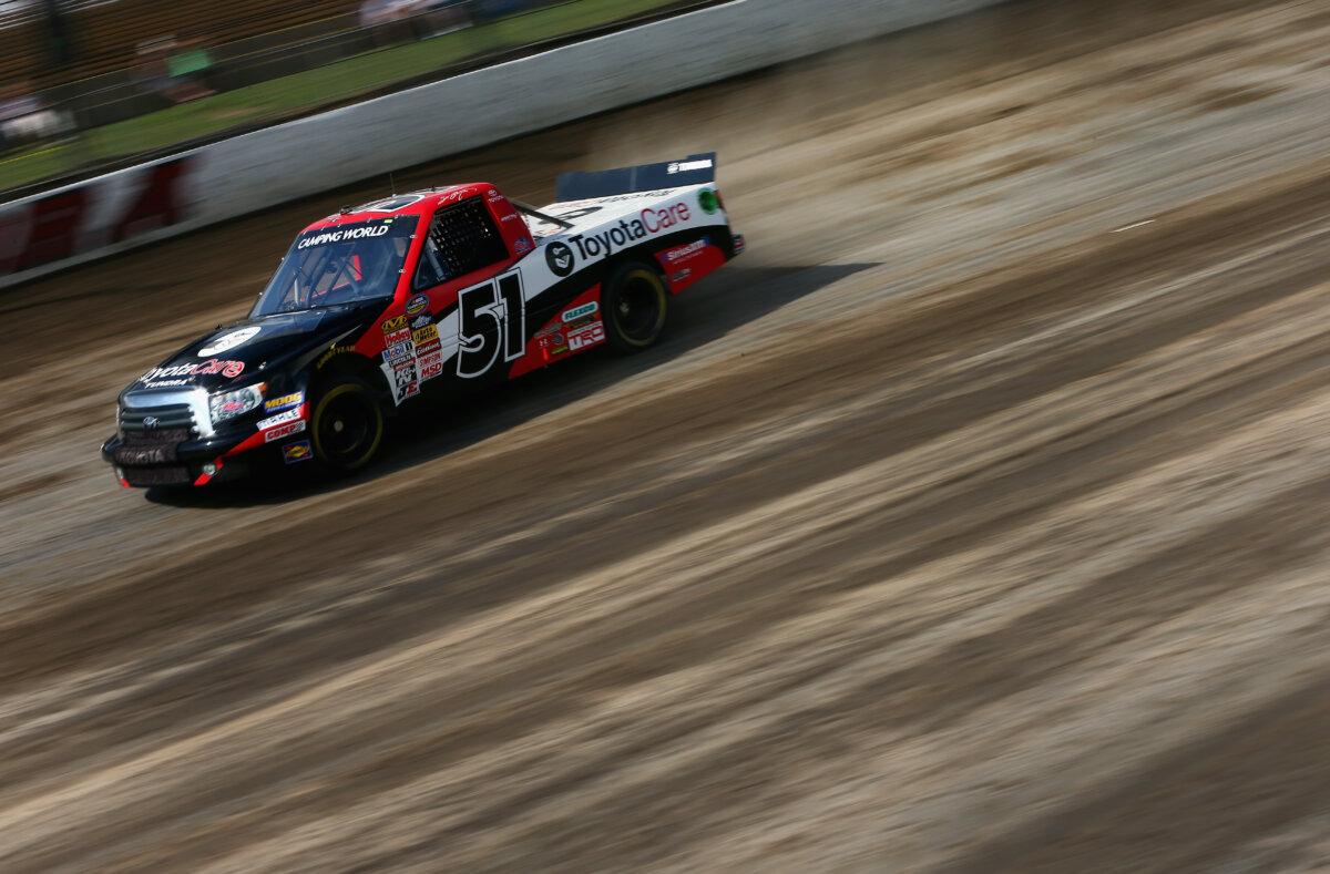 Scott Bloomquist drives the #51 ToyotaCare Toyota during practice for the NASCAR Camping World Truck Series inaugural Mudsummer Classic in Rossburg, Ohio, on July 23, 2013. (Tom Pennington/Getty Images)