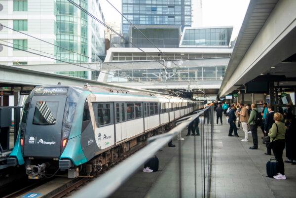Passengers wait for the arrival of a Sydney Metro train at Chatswood Metro station for the first day of public travel, Sydney, Australia, on Aug. 19, 2024. (AAP Image/Jeremy Piper)