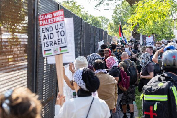 Pro-Palestinian protesters march near the DNC in Chicago, Ill., Aug. 19., 2024. (John Fredricks/The Epoch Times)