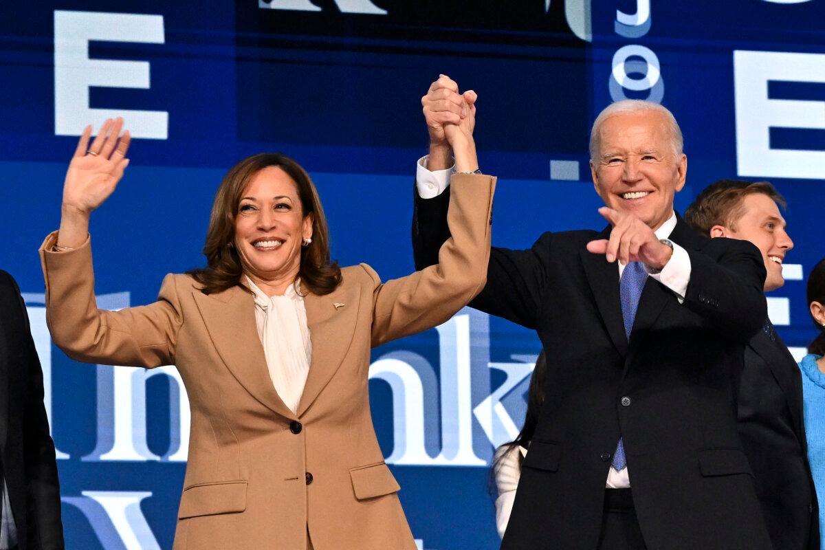 President Joe Biden with Vice President Kamala Harris after delivering the keynote address on the first day of the Democratic National Convention at the United Center in Chicago on Aug. 19, 2024. (Robyn Beck/AFP via Getty Images)