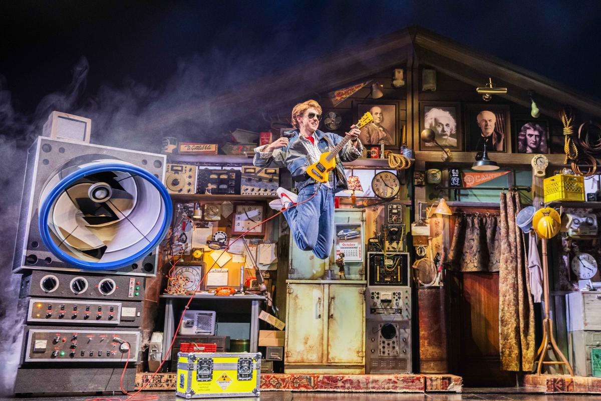 Marty McFly (Caden Brauch) plays the guitar, in "Back to the Future: The Musical." (Matthew Murphy and Evan Zimmerman)