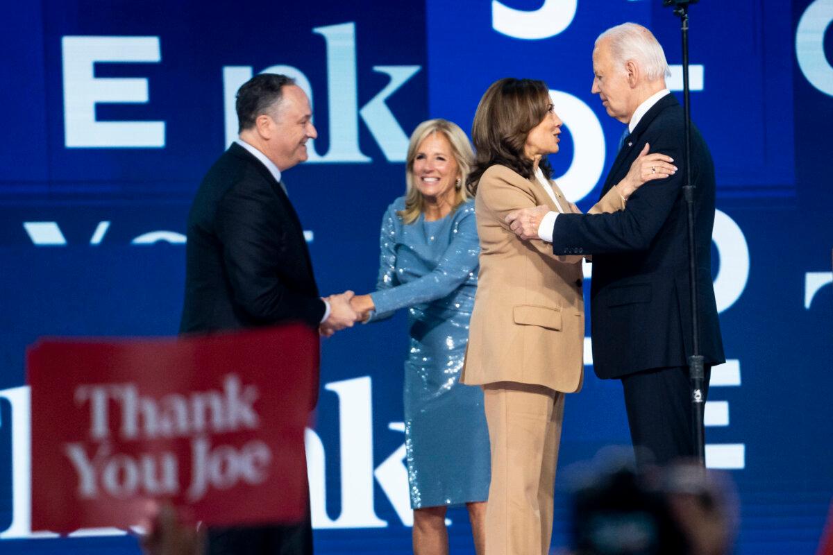Second Gentleman Douglas Emhoff, First Lady Jill Biden, Democratic presidential nominee Vice President Kamala Harris, and President Joe Biden on the stage at the end of the first day of the Democratic National Convention in Chicago on Aug. 19, 2024. (Madalina Vasiliu/The Epoch Times)