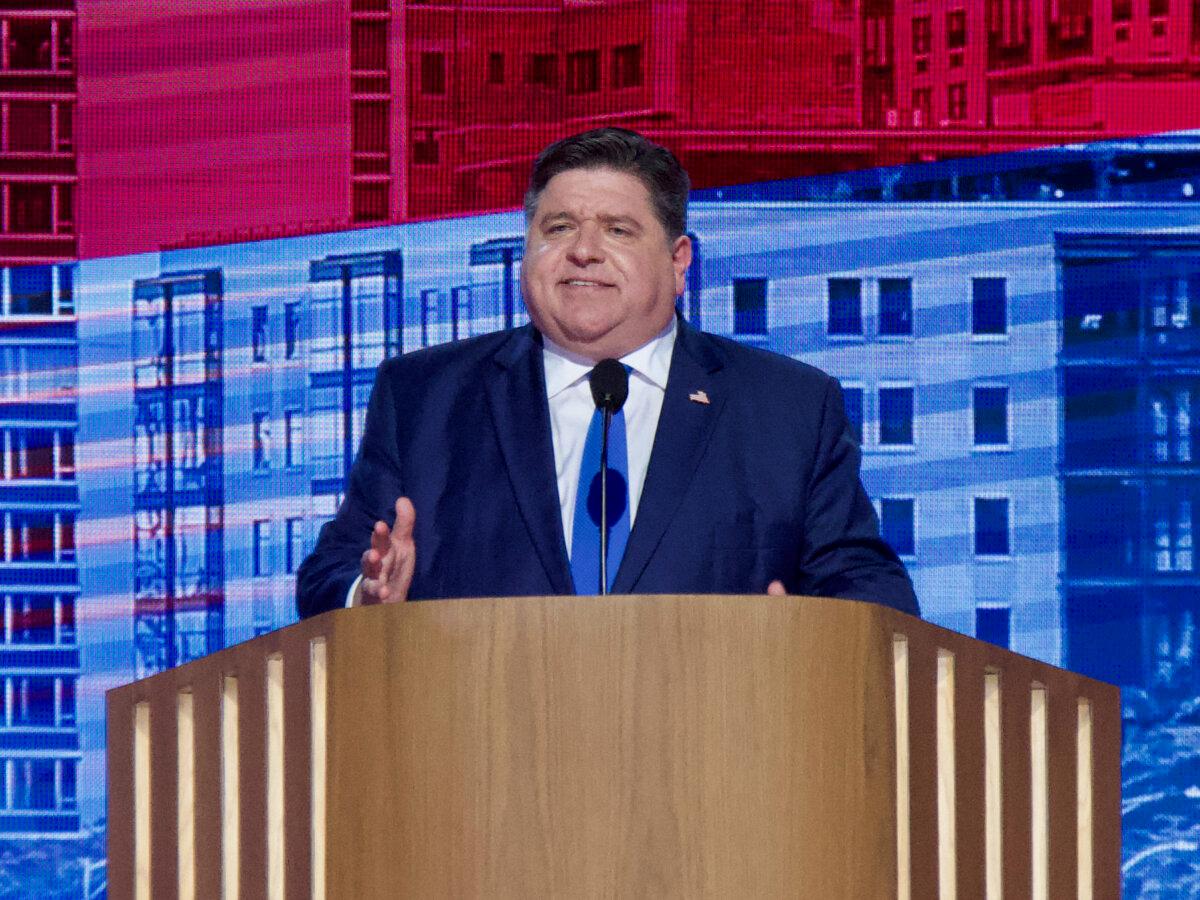 Illinois Gov. J.B. Pritzker addresses the crowd at the Democratic National Convention in Chicago, Illinois, on Aug. 20, 2024. (Travis Gillmore/The Epoch Times)