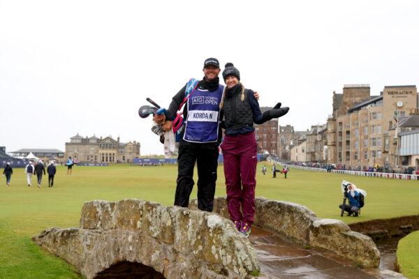 Nelly Korda of the United States and her caddie Jason McDede pose for a photo during the a Pro-Am ahead of the AIG Women's Open at St Andrews Old Course in St Andrews, Scotland, on Aug. 21, 2024. (Michael Reaves/Getty Images)