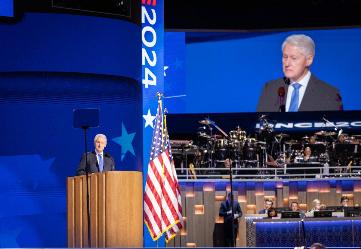 Former United States President Bill Clinton speaks at the 2024 DNC in Chicago, Ill., on Aug. 21, 2024. (John Fredricks/The Epoch Times)