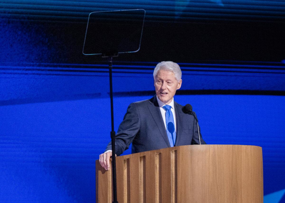 Former United States President Bill Clinton speaks at the 2024 DNC in Chicago, Ill., on Aug. 21, 2024. (John Fredricks/The Epoch Times)