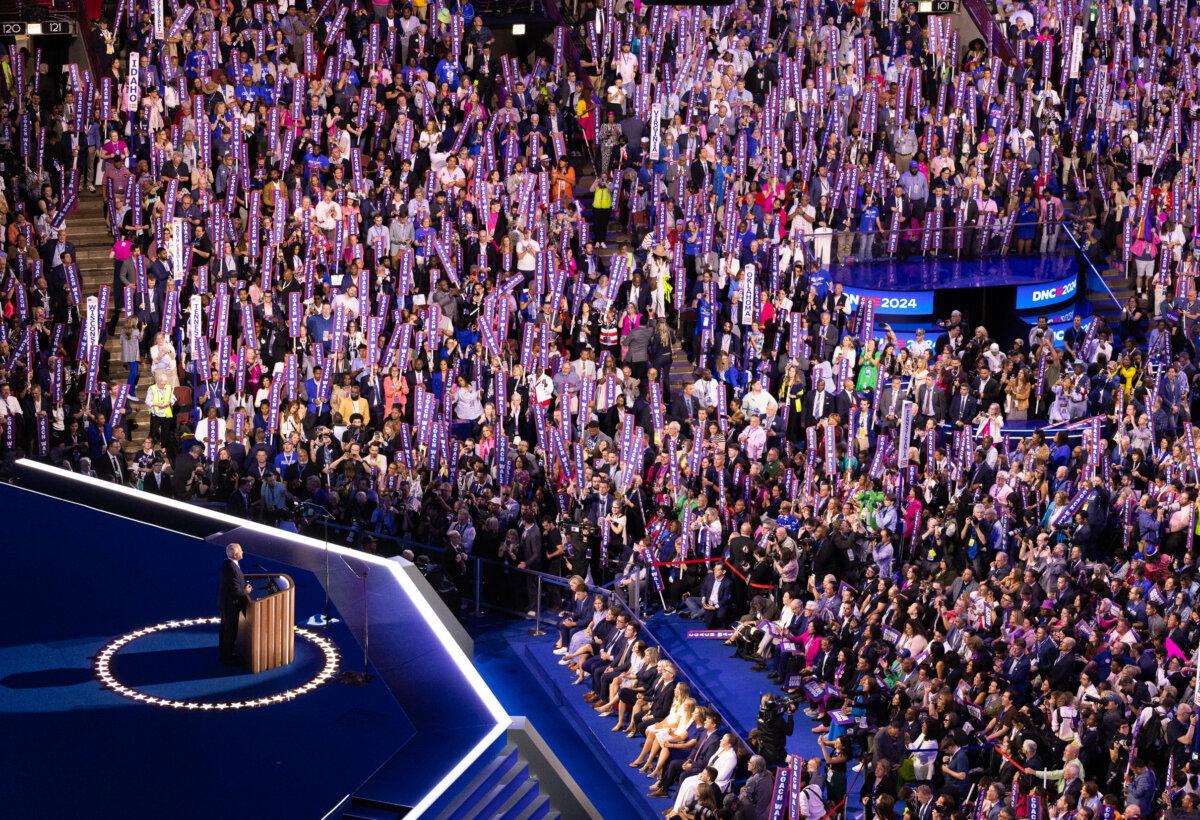 Vice Presidential nominee Tim Walz speaks to supporters at the 2024 DNC in Chicago, Ill., on Aug. 21, 2024. (John Fredricks/The Epoch Times)