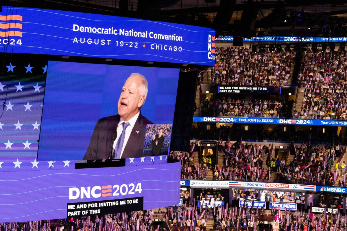 Vice Presidential nominee Tim Waltz speaks to supporters at the 2024 DNC in Chicago, Ill., on Aug. 21, 2024. (John Fredricks/The Epoch Times)