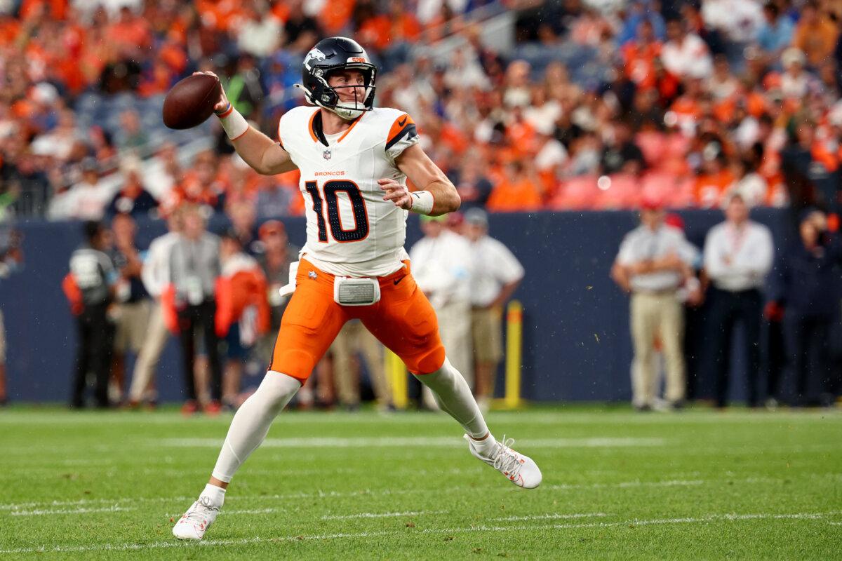 Bo Nix #10 of the Denver Broncos throws against the Green Bay Packers during a preseason game at Empower Field at Mile High in Denver, Colorado, on August 18, 2024. (Jamie Schwaberow/Getty Images)