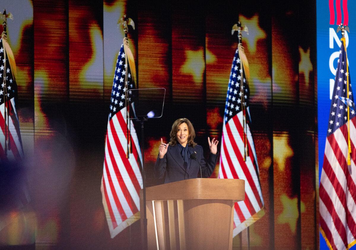 Presidential candidate and US Vice President Kamala Harris speaks at the 2024 DNC held in Chicago, Ill., on Aug. 22, 2024. (John Fredricks/The Epoch Times)