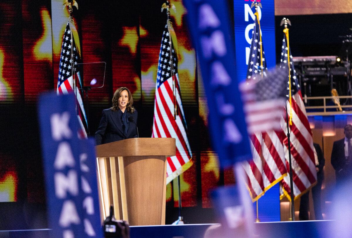 Presidential candidate and US Vice President Kamala Harris speaks at the 2024 DNC held in Chicago, Ill., on Aug. 22, 2024. (John Fredricks/The Epoch Times)