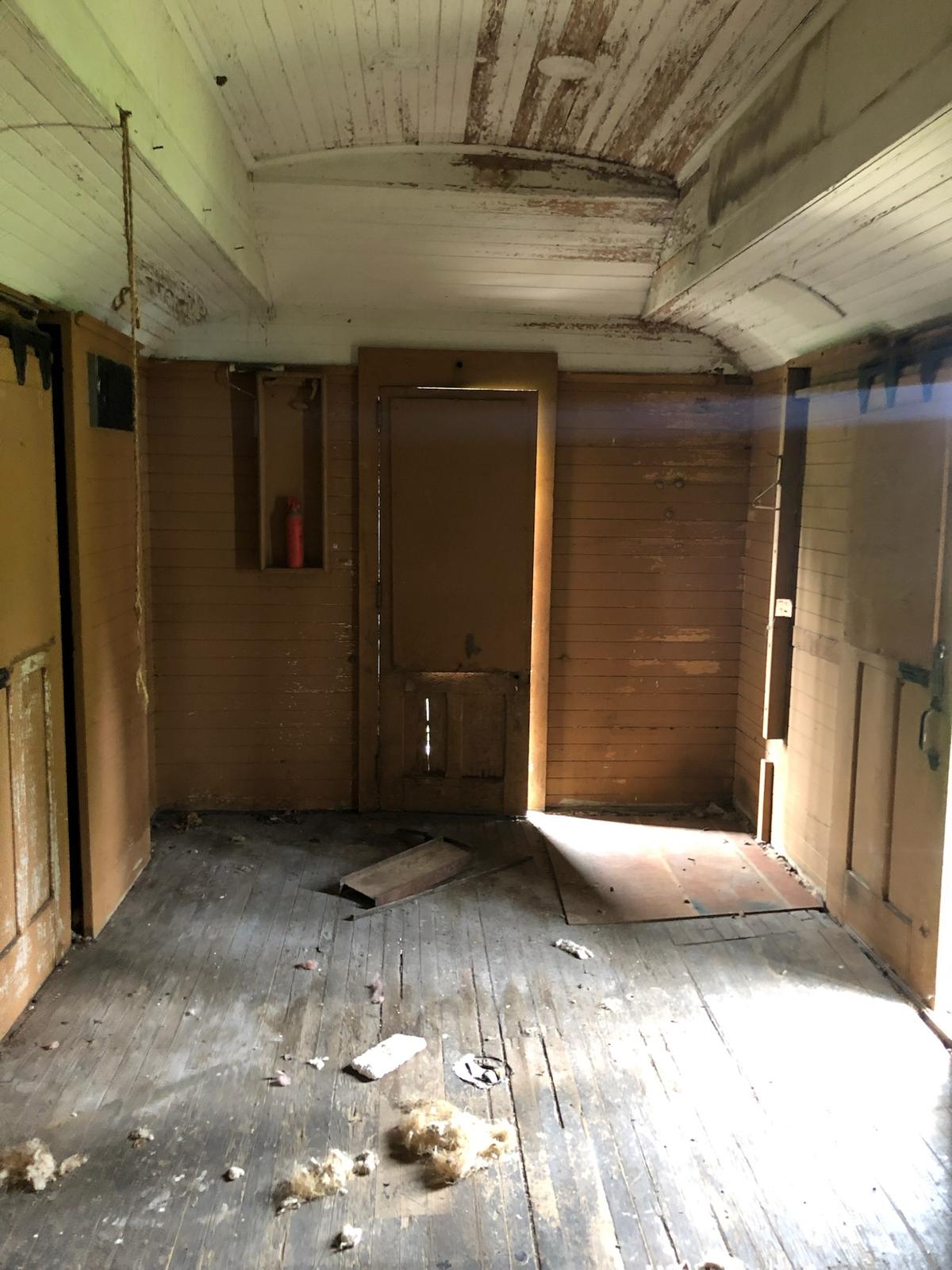 The interior of the train car before renovation. (Courtesy of <a href="https://x.com/isaacfrench_/status/1823724049606041803/photo/3">Isaac French</a>)