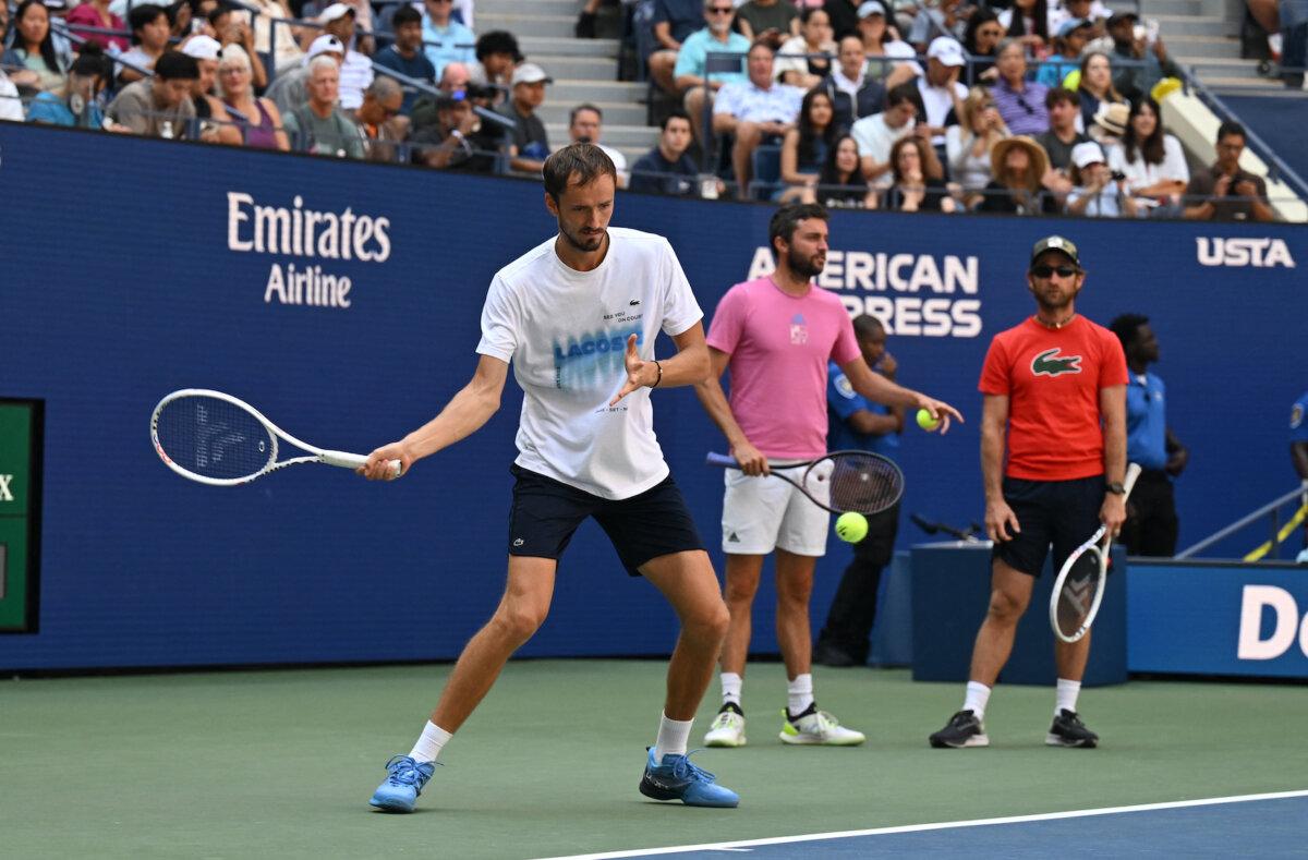 Daniil Medvedev (left) of Russia practices on Aug.22, 2024, ahead of the 2024 US Tennis Open at the USTA Billie Jean King National Tennis Center in New York. (Timothy A. Clary/AFP via Getty Images)