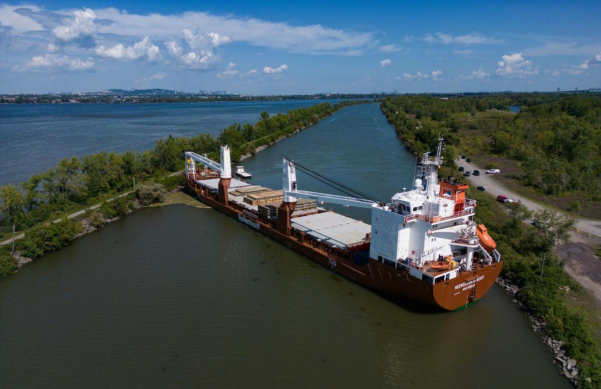 Tugboats Free Grounded Cargo Ship Blocking Traffic in St. Lawrence Seaway