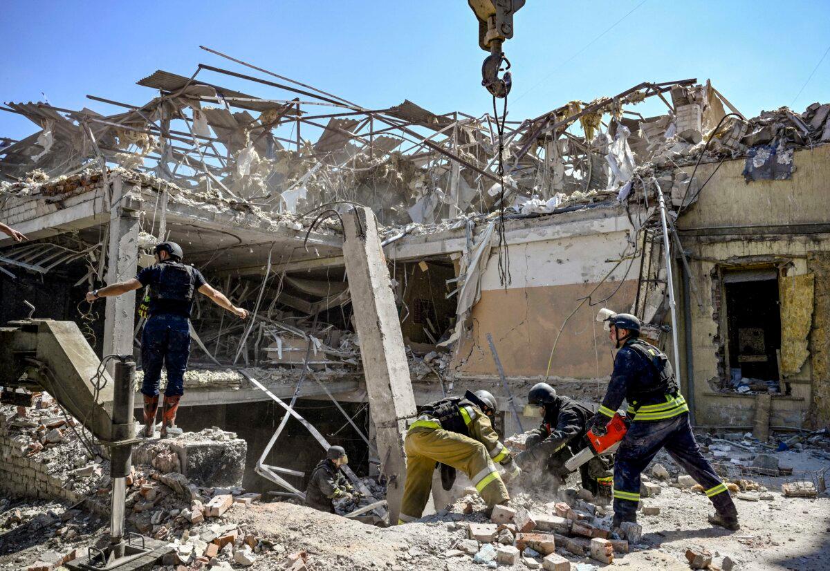 Ukrainian emergency services carry out a search and rescue operation among the rubble of a destroyed hotel after a strike in the town of Kramatorsk, Donetsk region in Ukraine on Aug. 25, 2024. (Genya Savilov/AFP via Getty Images)