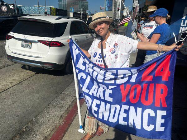 Julia Fosman of San Diego immigrated from Romania years ago. She volunteers to support presidential candidate Robert F. Kennedy Jr. to protect liberty, she said. (Jill McLaughlin/The Epoch Times)