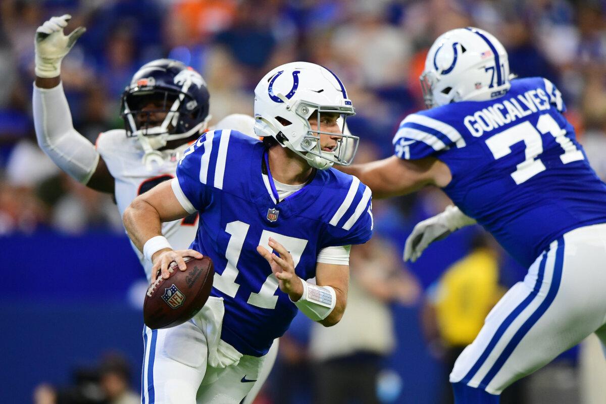 Kedon Slovis #17 of the Indianapolis Colts carries the ball during the second half of a preseason game against the Denver Broncos at Lucas Oil Stadium in Indianapolis, Ind., on Aug. 11, 2024. (Emilee Chinn/Getty Images)