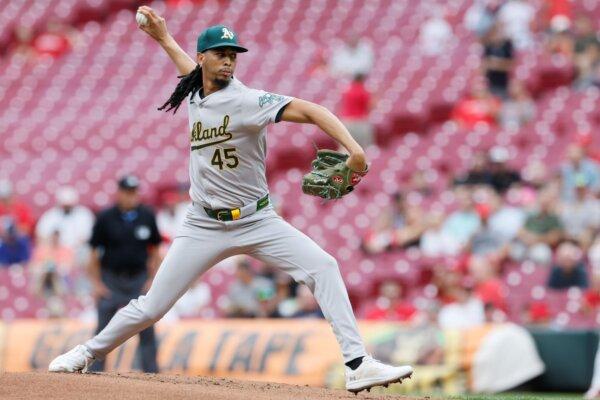 A's starting pitcher Osvaldo Bido throws against the Reds in Cincinnati on Aug. 28, 2024. (Jay LaPrete/AP Photo)