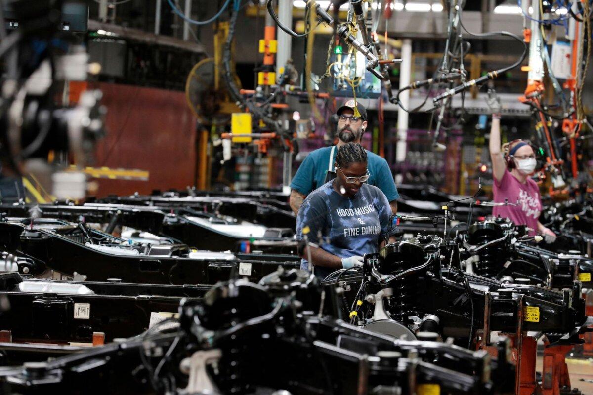 Ford Pulls Back on DEI Policies, Withdraws From Corporate Equality Index | USNN World News Workers put engines on the frame of Ford Motor Co. fuel-powered F-150 trucks under production at its truck plant in Dearborn, Mich. on Sept. 20, 2022. (Jeff Kowalsky/AFP via Getty Images)