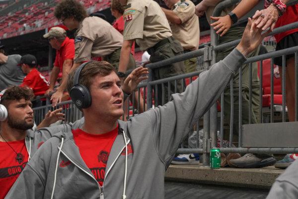 Quarterback Will Howard of the Ohio State Buckeyes greets fans before the game against the Akron Zips at Ohio Stadium in Columbus, Ohio, on Aug. 31, 2024. (Jason Mowry/Getty Images)
