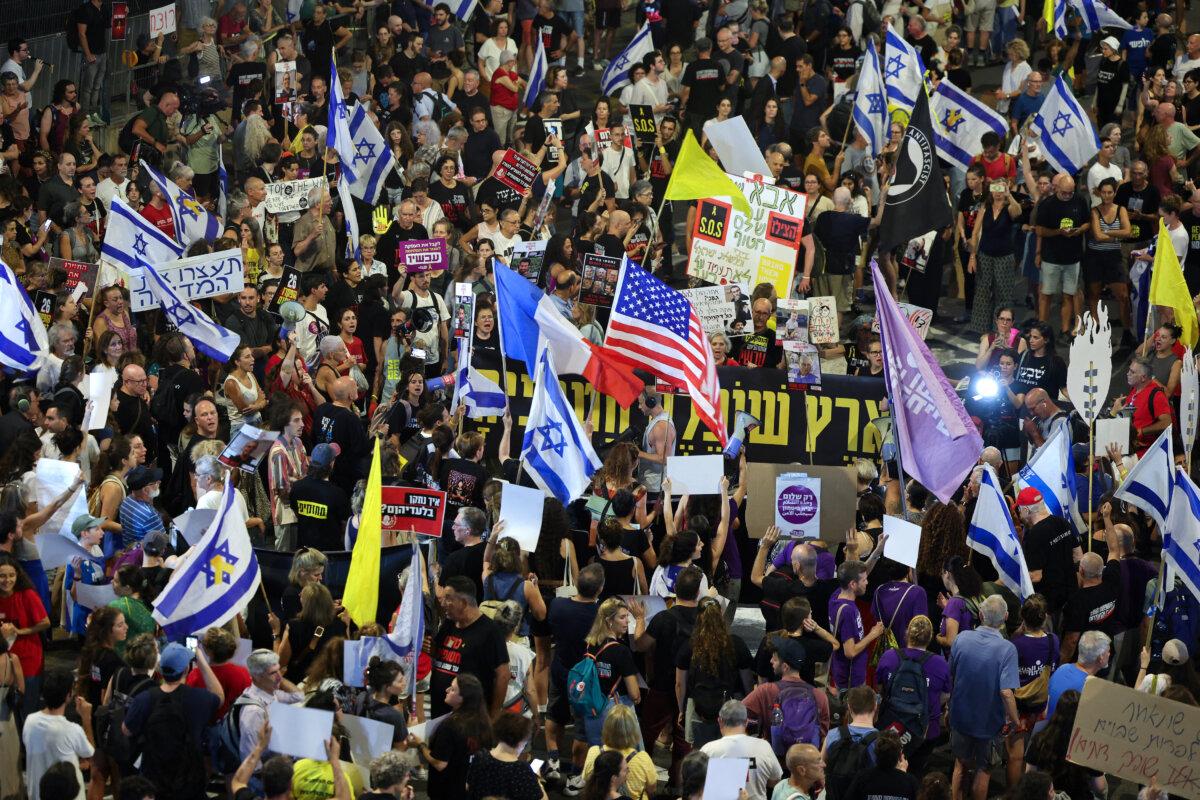 Demonstrators march during an anti-government protest amid the ongoing war between Israel and Hamas, in the coastal city of Tel Aviv, Israel, on Sept. 3, 2024. (Jack Guez/AFP/Getty Images)