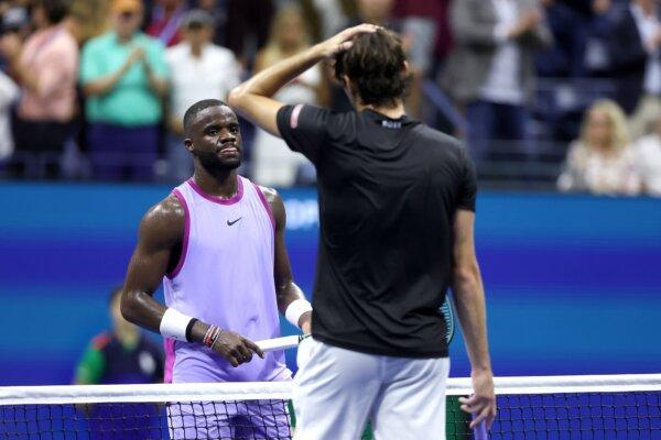 Francis Tiafoe moves to embrace Taylor Fritz after Fritz beat him in the U.S. Open men's singles semifinals at USTA Billie Jean King National Tennis Center in New York City on Sept. 6, 2024. (Matthew Stockman/Getty Images)