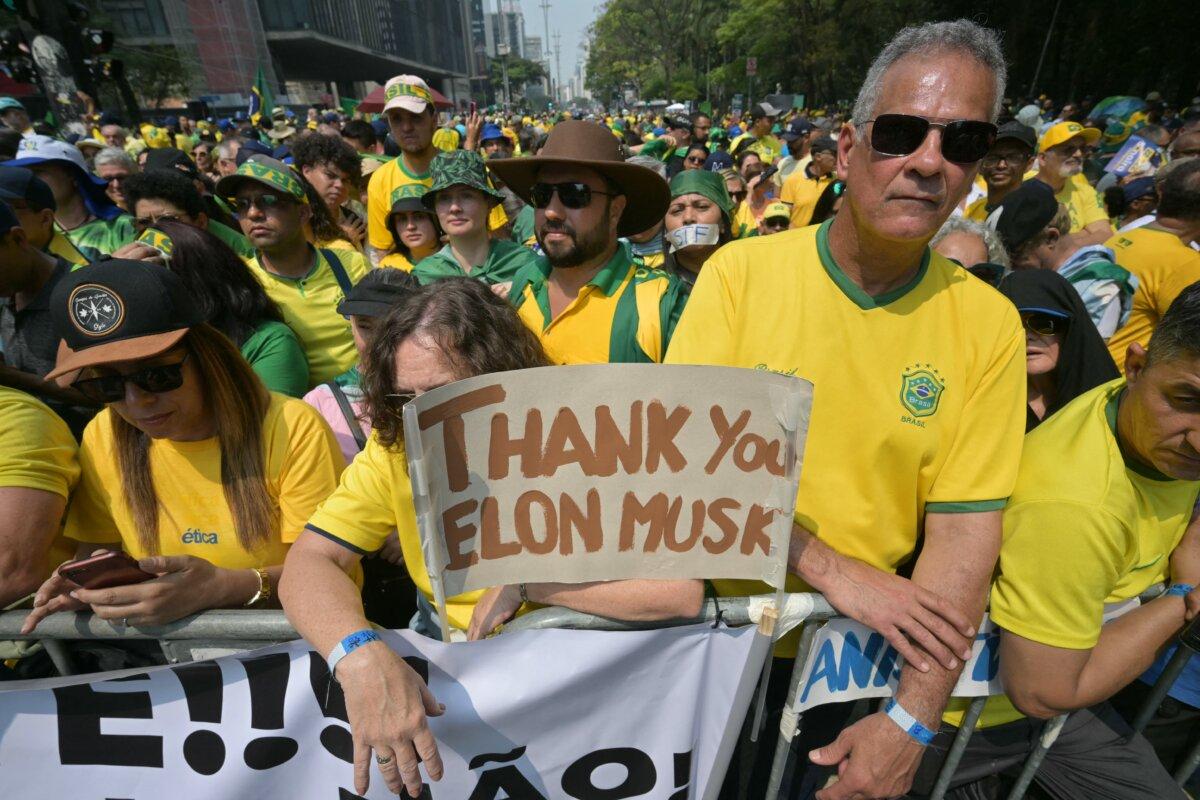Supporters of former Brazilian President Jair Bolsonaro hold a sign thanking X social media platform owner Elon Musk, during an Independence Day rally in São Paulo, Brazil, on Sept. 7, 2024. (Nelson Almeida/AFP via Getty Images)