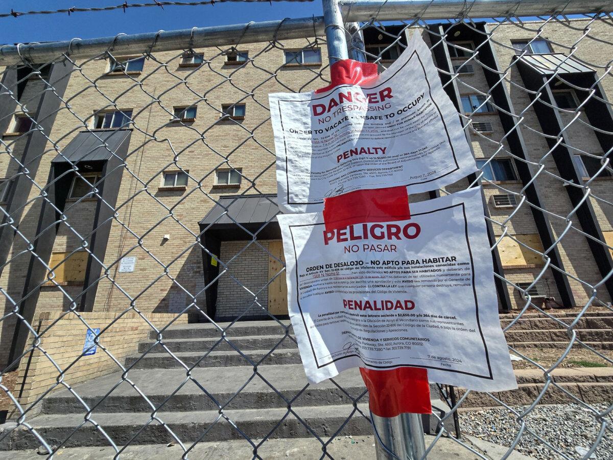 An apartment building complex on Nome Street in Aurora, Colo., was shut down by the city recently over code violations. Residents say the building was a hotspot for migrant gang activity. Photo taken on Aug. 30, 2024. (Allan Stein/The Epoch Times)