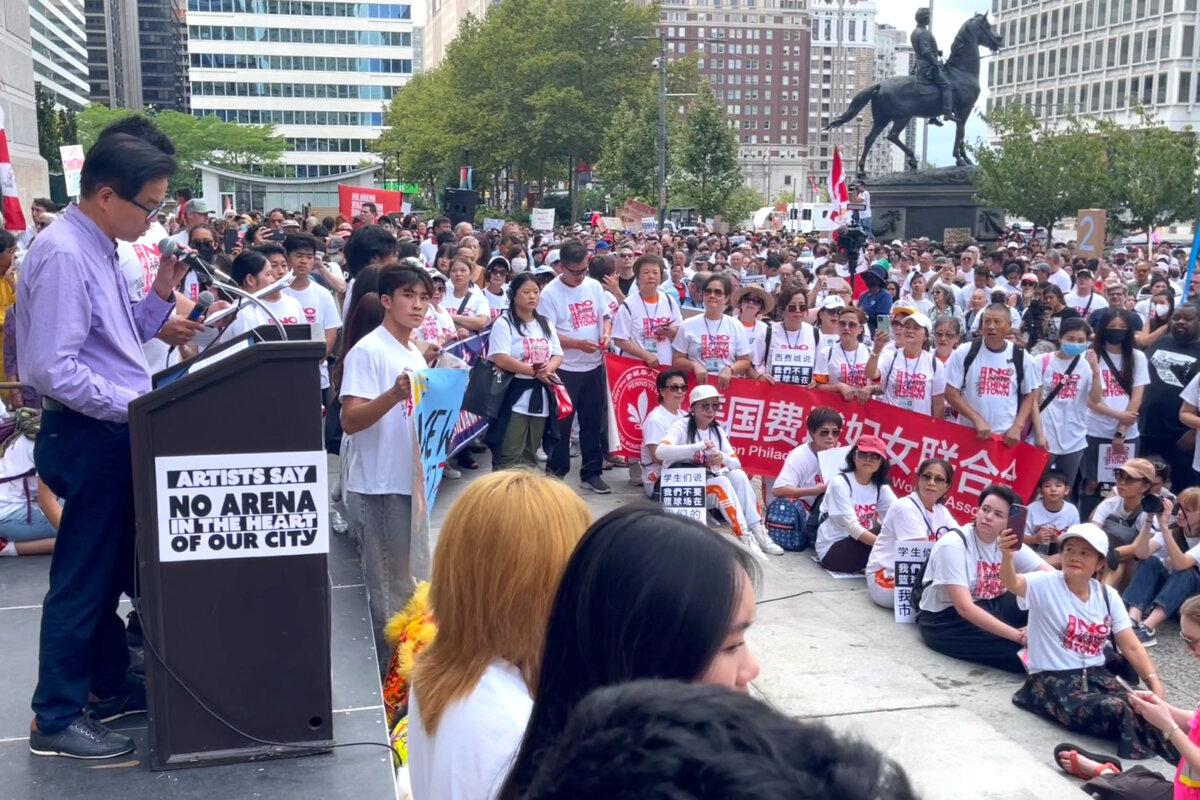 Bobby Zhang (left), General Secretary of the Pennsylvania United Chinese Coalition Inc., speaks at the rally outside Philadelphia City Hall on Sept. 7, 2024. (Frank Liang/The Epoch Times)