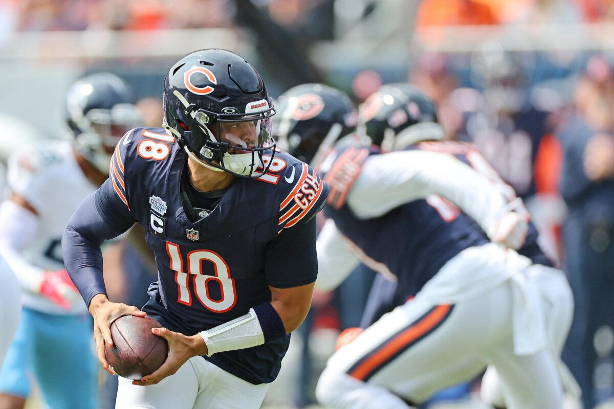 Caleb Williams #18 of the Chicago Bears looks to pass during a game against the Tennessee Titans at Soldier Field in Chicago, Ill., on Sept. 8, 2024. The Bears defeated the Titans 24-17. (Stacy Revere/Getty Images)