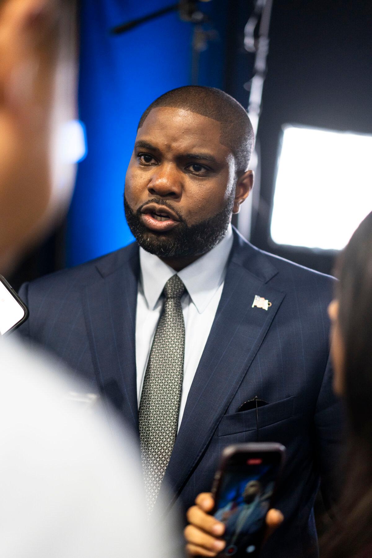 Rep. Byron Donalds (R-Fla.) speaks to reporters at the media filing center and spin room at the Pennsylvania Convention Center on Sept. 10, 2024. (Madalina Vasiliu/The Epoch Times)