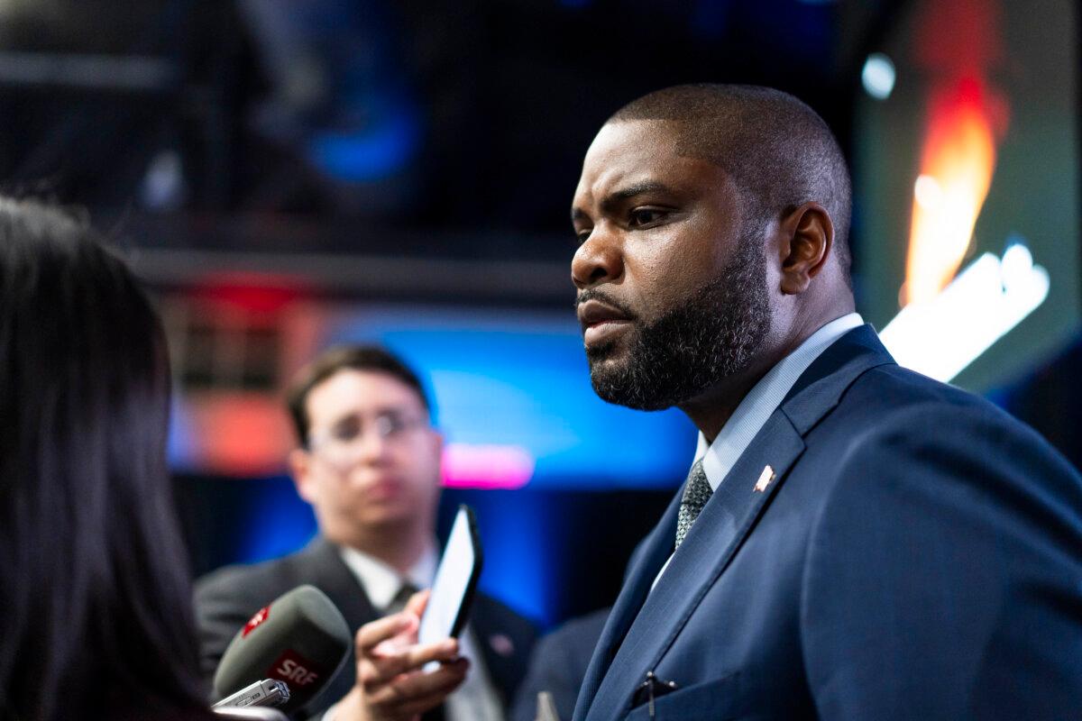 Rep. Byron Donalds (R-Fla.) speaks to reporters at the media filing center and spin room at the Pennsylvania Convention Center ahead of the presidential debate between Republican nominee former President Donald J. Trump and Democratic nominee Vice President Kamala Harris in Philadelphia, Pa., on Sept. 10, 2024. (Madalina Vasiliu/The Epoch Times)