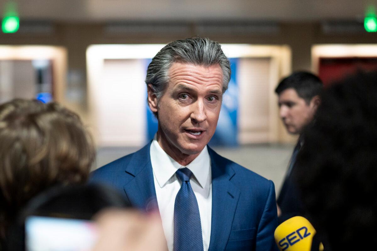 California Gov. Gavin Newsom speaks to reporters at the media filing center and spin room at the Pennsylvania Convention Center ahead of the presidential debate between Republican nominee former President Donald J. Trump and Democratic nominee Vice President Kamala Harris in Philadelphia, Pa., on Sept. 10, 2024. (Madalina Vasiliu/The Epoch Times)