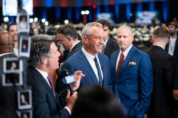 Robert F. Kennedy Jr. speaks to reporters at the media filing center and spin room at the Pennsylvania Convention Center ahead of the presidential debate between Republican nominee former President Donald J. Trump and Democratic nominee Vice President Kamala Harris in Philadelphia on Sept. 10, 2024. (Madalina Vasiliu/The Epoch Times)