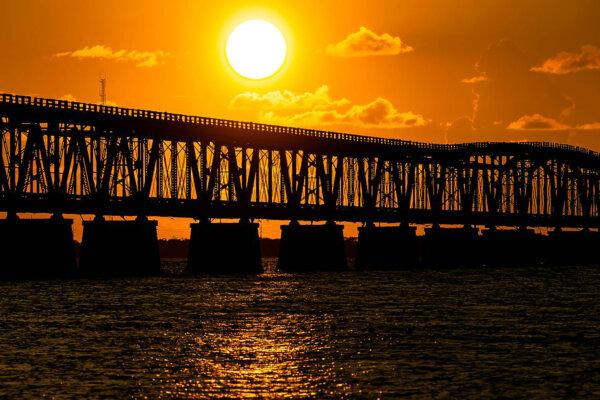 Sunset over Henry Flagler's Overseas Railroad at Bahia Honda State Park near Big Pine Key, Florida, on Monday, Oct. 11, 2021. (Matias J. Ocner/Miami Herald/TNS)
