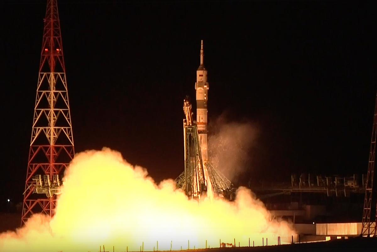 Soyuz Craft With 2 Russians and 1 American Docks at International Space Station