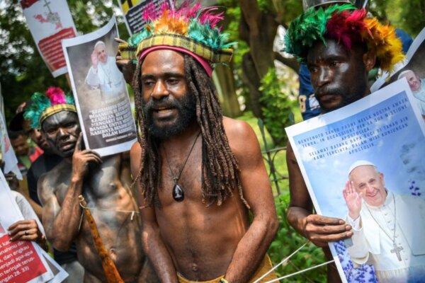 Papuans take part in a protest held in front of the Vatican's diplomatic mission in Jakarta on Sept. 4, 2024, to request Pope Francis's immediate intervention against the Indonesian government's military operations in Papua province. (Bay Ismoyo/AFP via Getty Images)