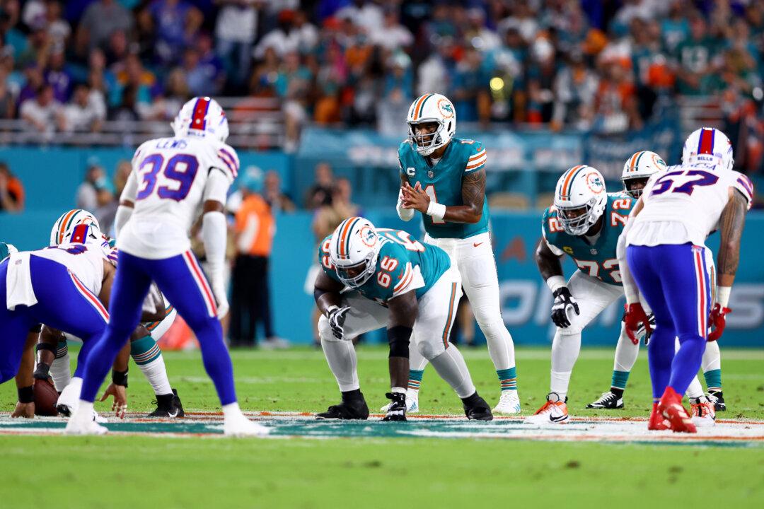 Sports Brief: Bills Smash Dolphins in AFC Showdown; Early Rivalry Games in College Football Week 3; Baseball Wildcard Races Head to the Wire