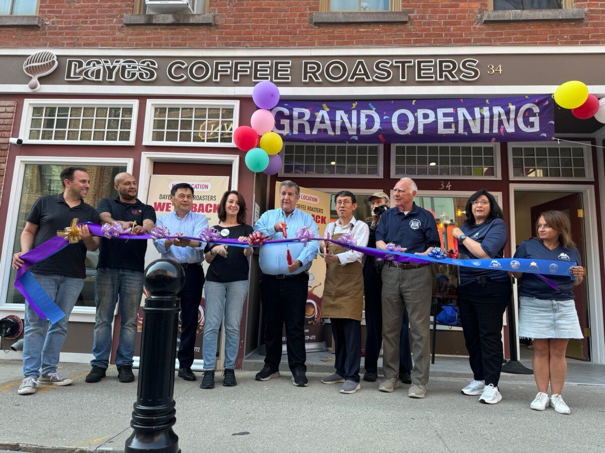 (L–R) City clerk Richard McCormack, Juan Avalos, Jim Zhang, state Assembly candidate Paula Kay, Mayor Joseph DeStefano, Grant Lee, City Councilmen Gerald Kleiner and Joseph Masi, city economic development director Maria Bruni, and Stefania Sande at the grand opening of Dayes Coffee in Middletown, N.Y., on Sept. 13, 2024. (Cara Ding/The Epoch Times)