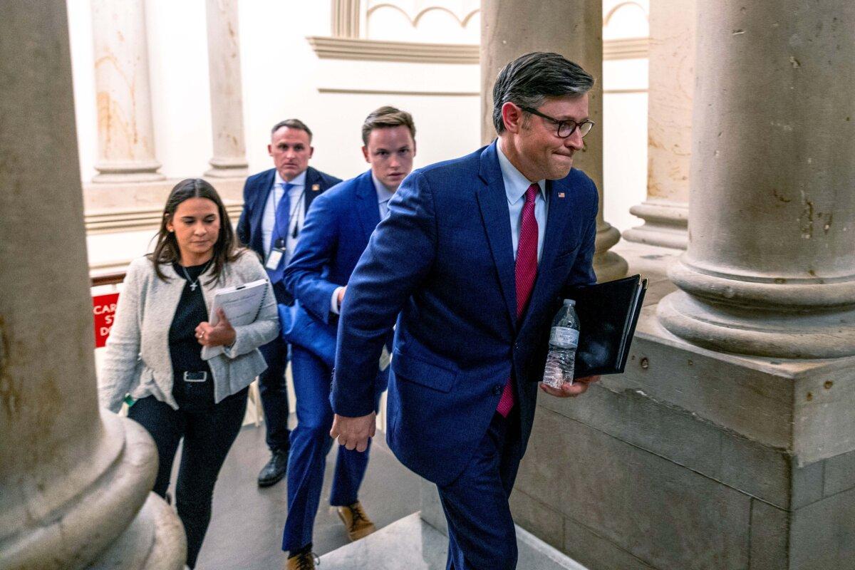 Speaker of the House Mike Johnson (R-LA) heads to his office before the vote on the government funding bill at the U.S. Capitol on September 18, 2024. (Tasos Katopodis/Getty Images)