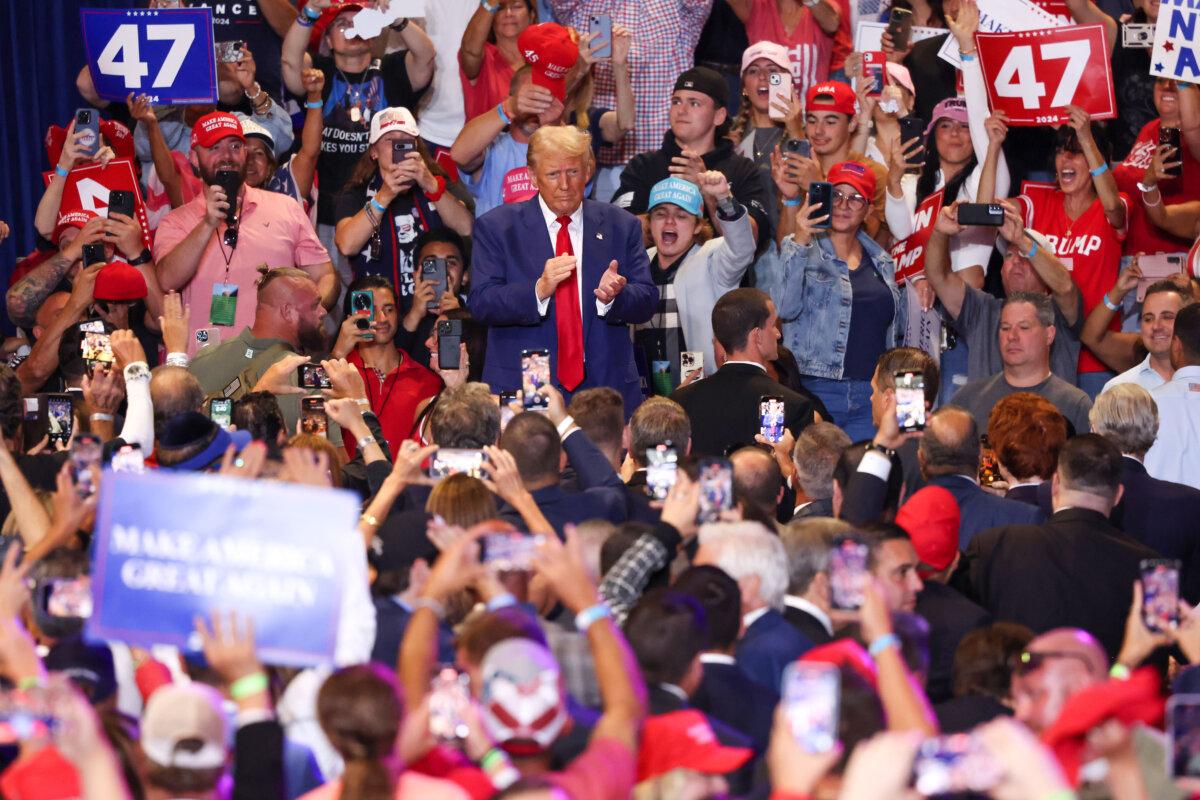 Republican presidential nominee, former President Donald Trump leaves the stage after speaking during a campaign rally at Nassau Veterans Memorial Coliseum in Uniondale, New York, on Sept. 18, 2024. (Michael M. Santiago/Getty Images)