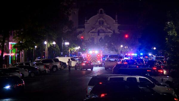 Police and emergency vehicles in the entertainment district after a shooting in Birmingham, Ala., on Sept. 22, 2024. (Bill Castle/WBMA via AP)