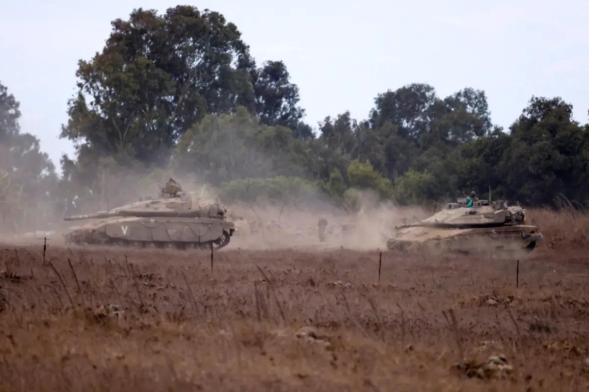 Israeli tanks are being moved, amid cross-border hostilities between Hezbollah and Israel, in the Israeli-occupied Golan Heights on Sept. 22, 2024. (Jim Urquhart/Reuters)